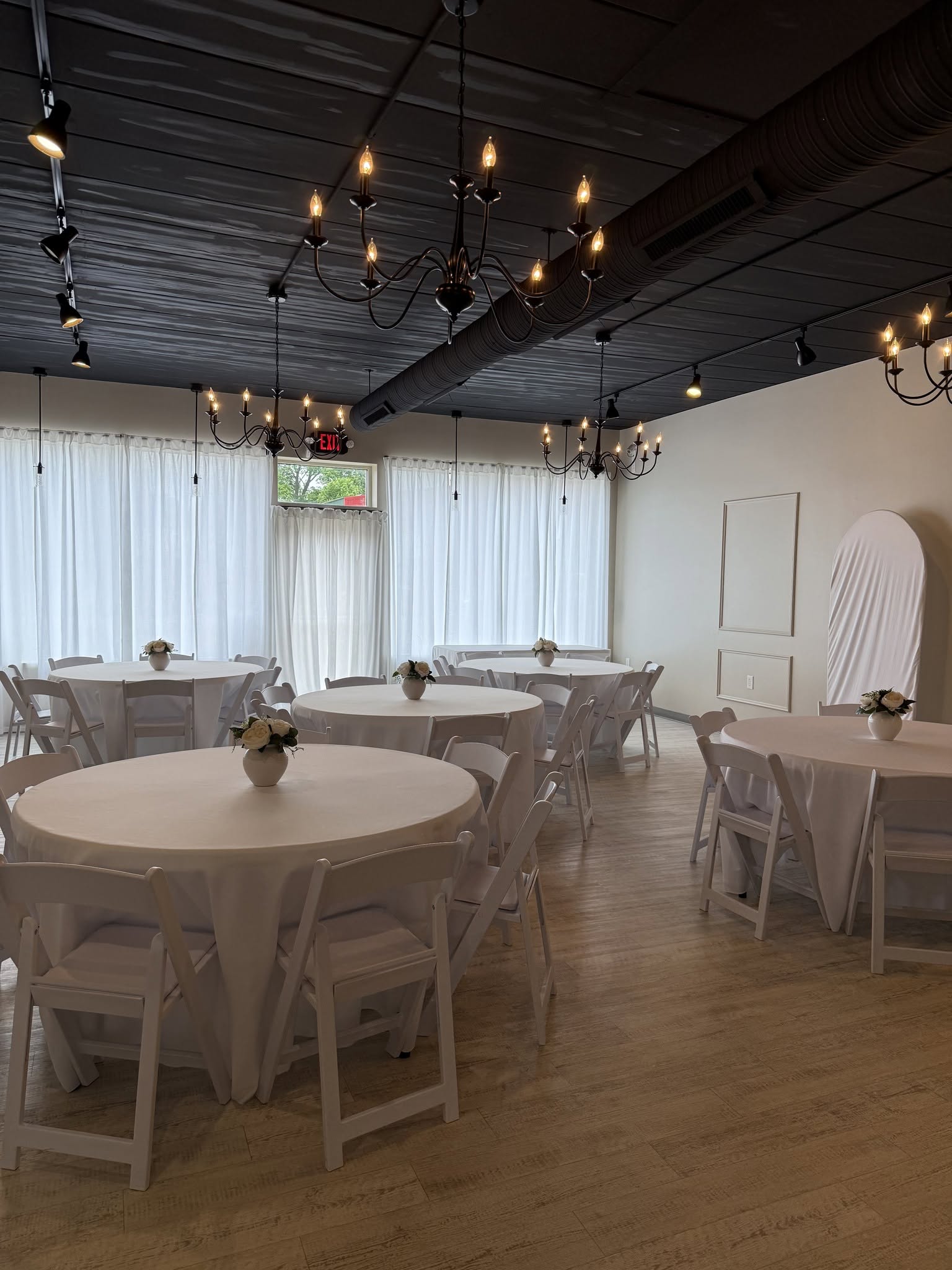 Venue prepared with ivory linens